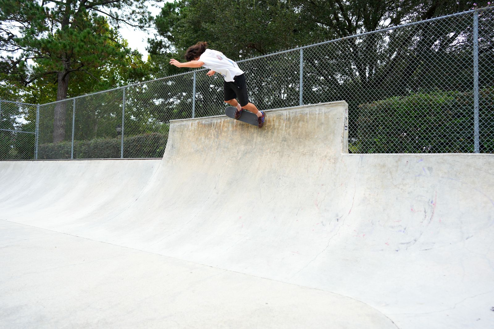 Jaden riding a steep transition at the top of the extension
