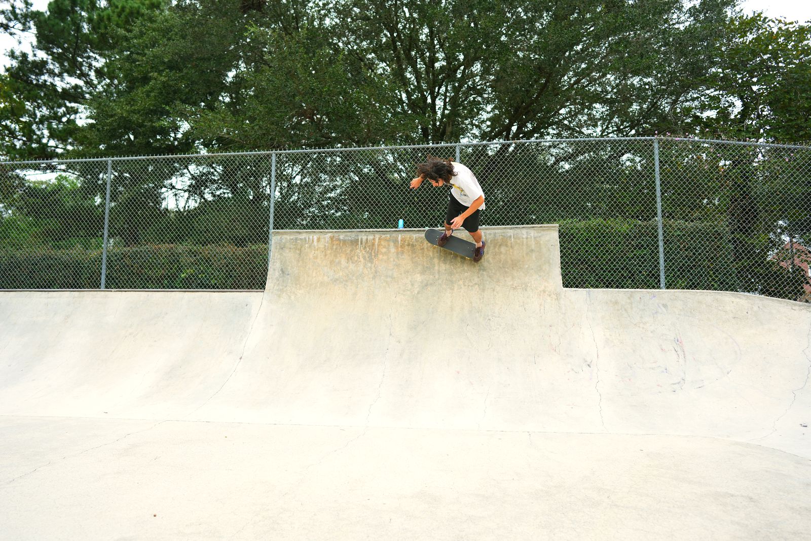 Jaden riding up the concrete extension wall