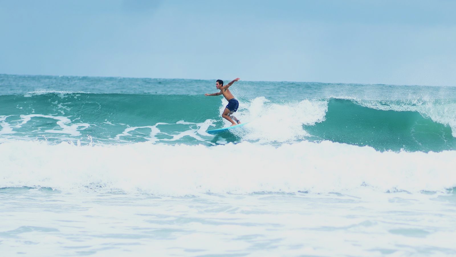 Jack laying into a top turn on a clean face