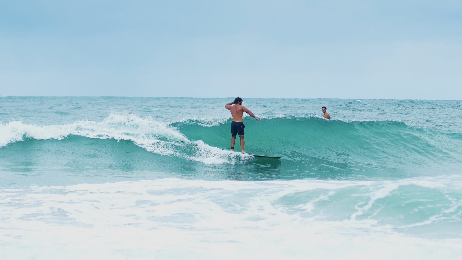 Turner trimming high on a small green wall