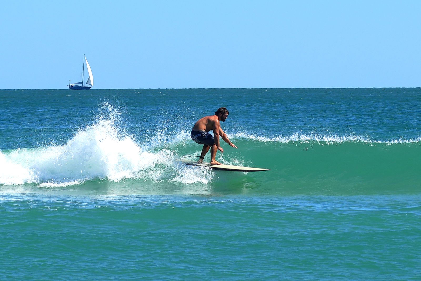 Turner turning off the top with spray behind him